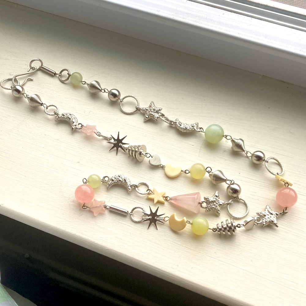 Whimsical necklace with stones, stars, moons and assorted pieces.  30”